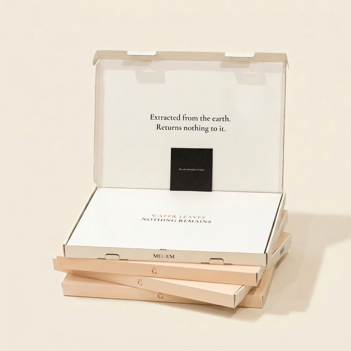 MEGEM retail box open on a stack of four, printed lid line, insert card, and inner board visible