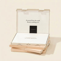 MEGEM retail box open on a stack of four, printed lid line, insert card, and inner board visible